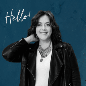 black and white image of Angella Johnson against dark teal background with "Hello" written in white script font.